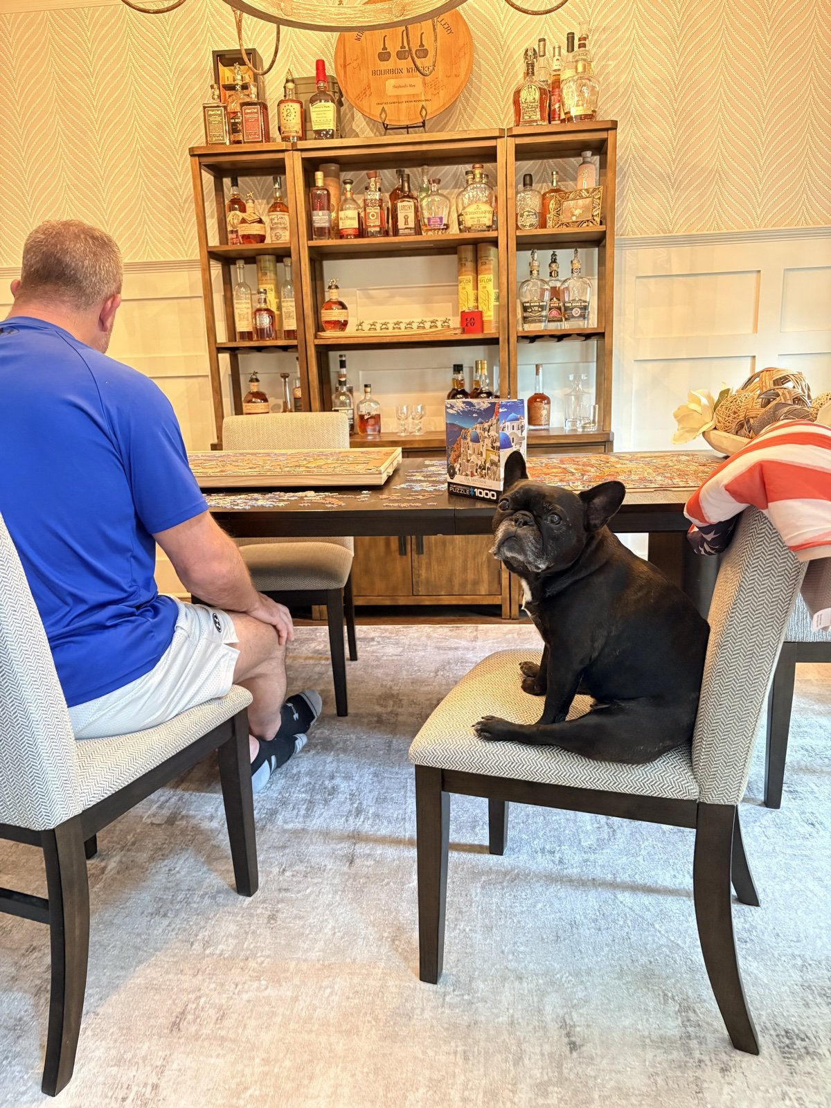 Palmer keeping watch while the puzzle gets built