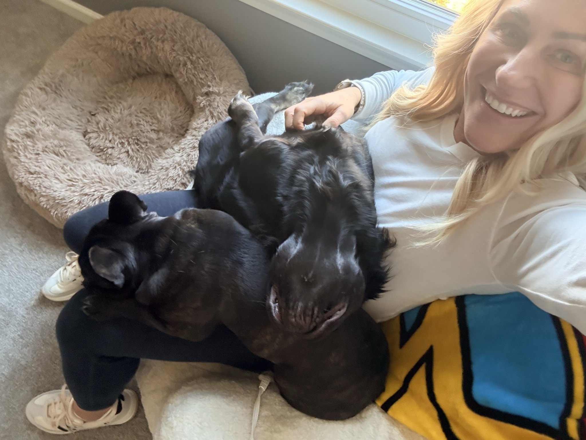 Palmer and Rosie piled on Lindsay for a cuddle