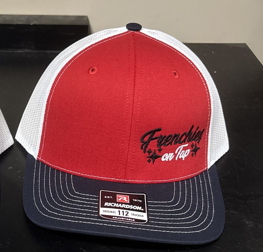 Richardson trucker hat with the original Frenchies on Tap wordmark logo